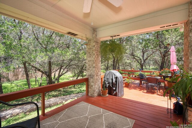 deck with ceiling fan and grilling area