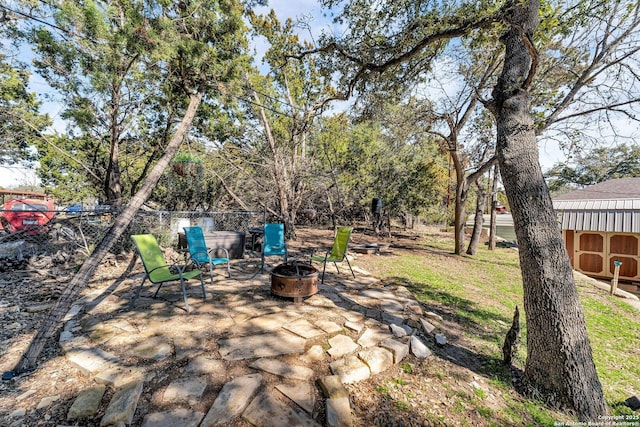 exterior space with a fire pit