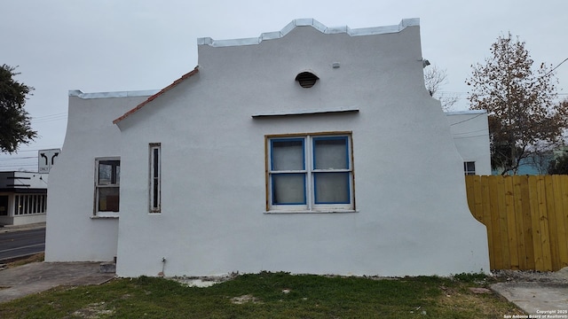 1601 Fulton Ave, San Antonio, TX 78201 - view of home's exterior featuring fence and stucco siding