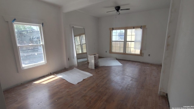 1601 Fulton Ave, San Antonio, TX 78201 - spare room featuring wood finished floors, a ceiling fan, and beam ceiling