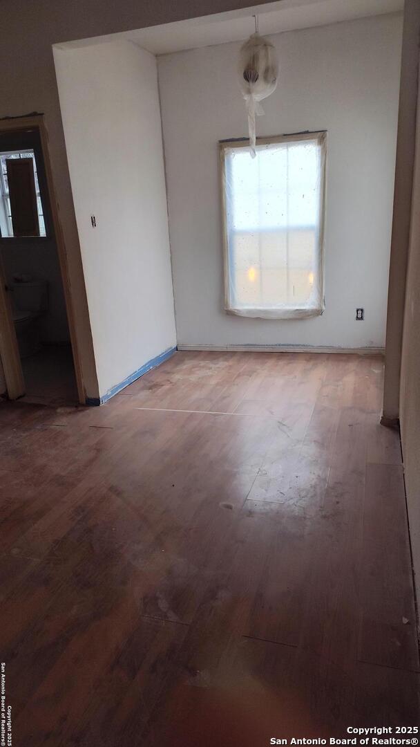 1601 Fulton Ave, San Antonio, TX 78201 - empty room with wood finished floors