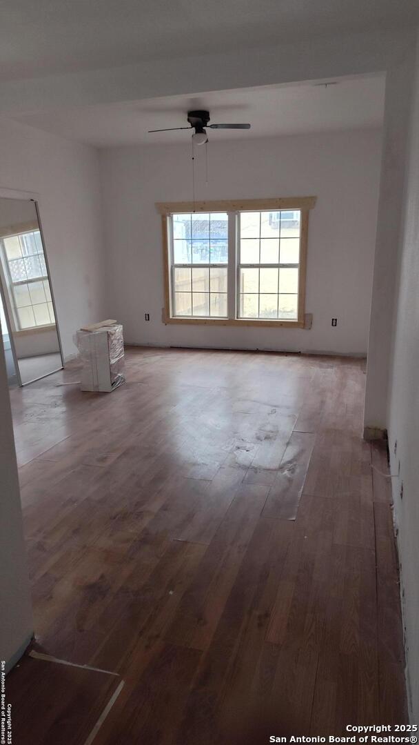 1601 Fulton Ave, San Antonio, TX 78201 - spare room featuring plenty of natural light, wood finished floors, and ceiling fan
