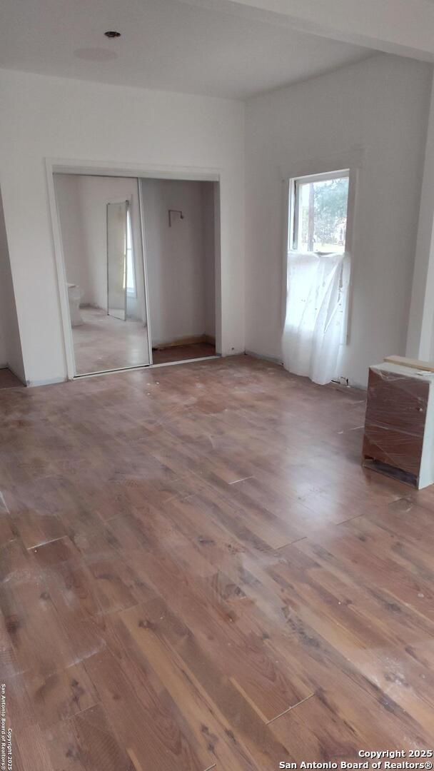 1601 Fulton Ave, San Antonio, TX 78201 - empty room featuring wood finished floors