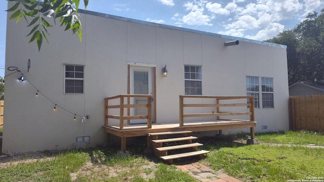 1601 Fulton Ave, San Antonio, TX 78201 - back of house with a deck, fence, and stucco siding