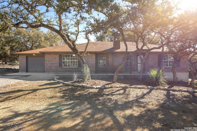 ranch-style home with a garage