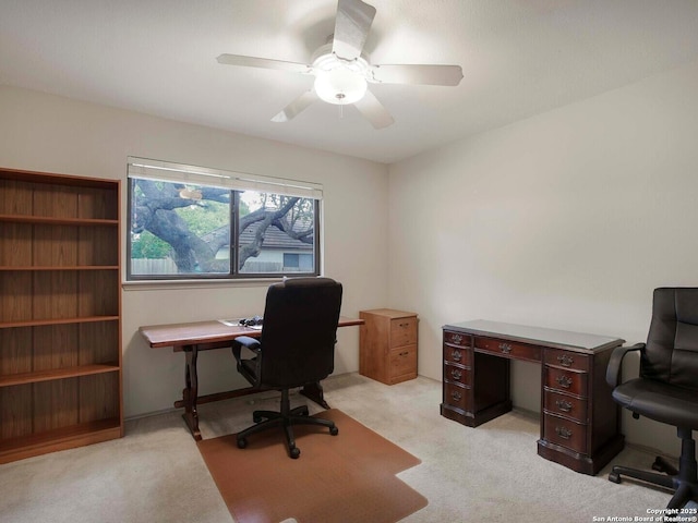 home office with light colored carpet and ceiling fan