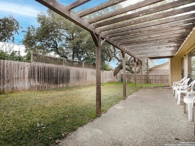 view of yard with a pergola and a patio area