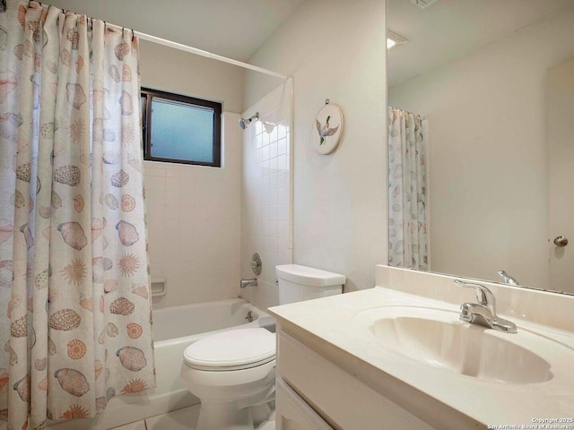 full bathroom featuring vanity, shower / bath combination with curtain, and toilet