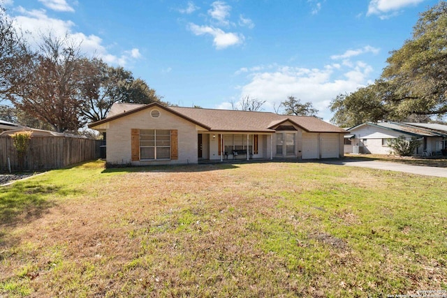 ranch-style home with a front yard