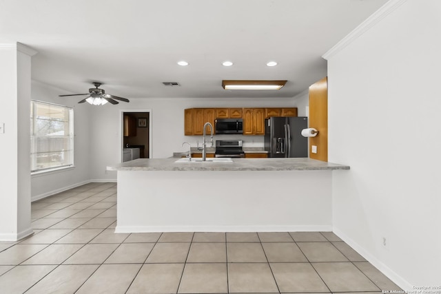 kitchen with sink, stainless steel electric stove, light tile patterned flooring, black refrigerator with ice dispenser, and kitchen peninsula