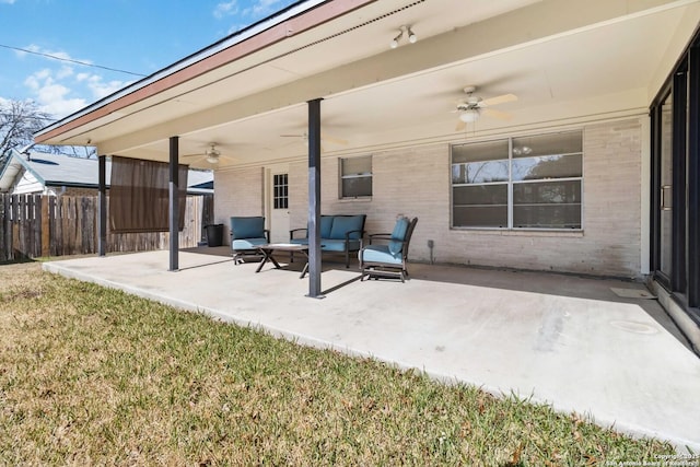 view of patio / terrace featuring an outdoor living space and ceiling fan