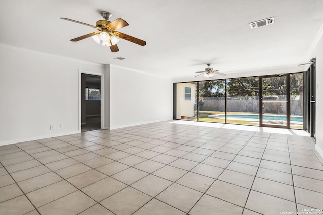 interior space with ceiling fan