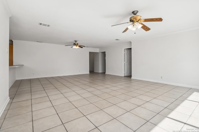 unfurnished room with crown molding and ceiling fan