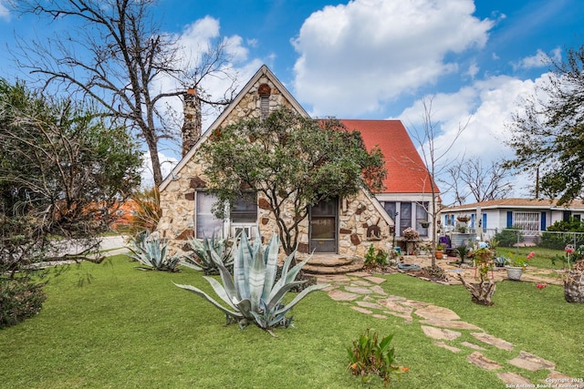 view of front of home with a front yard