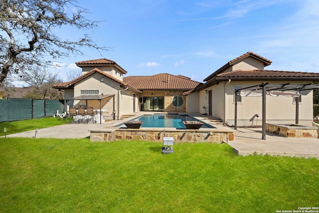 rear view of property featuring a patio, a lawn, an outdoor bar, a pergola, and a fenced in pool