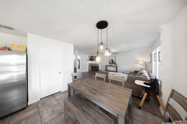 view of tiled dining space