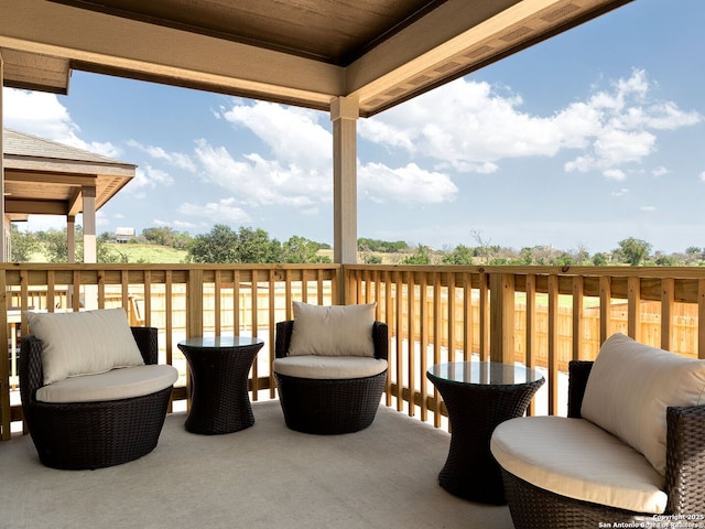 view of patio with a balcony