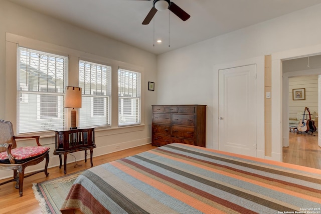 bedroom featuring ceiling fan and light wood-type flooring