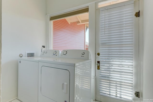 laundry room with washer and dryer