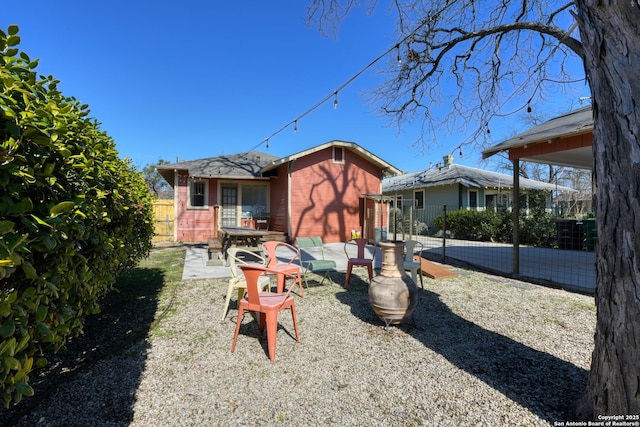 back of house featuring a patio