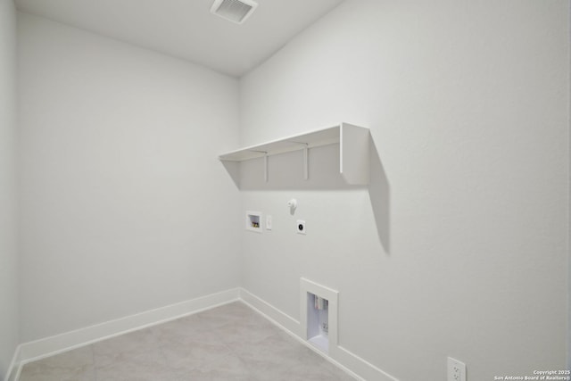 14527 Rainwater Trl, San Antonio, TX 78253 - laundry area with hookup for a gas dryer, electric dryer hookup, hookup for a washing machine, and baseboards