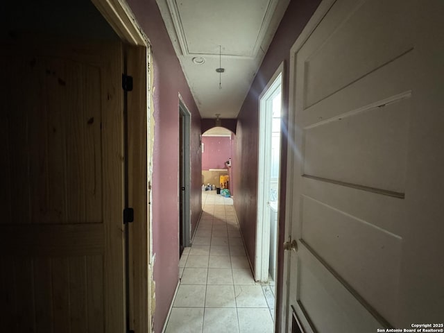 corridor featuring light tile patterned flooring