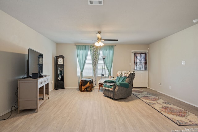 439 Agave Cir, Jourdanton, TX 78026 - sitting room featuring ceiling fan and light wood-type flooring