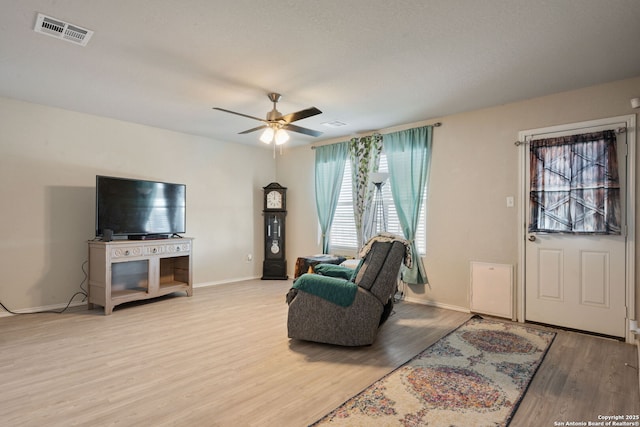 439 Agave Cir, Jourdanton, TX 78026 - living room with light hardwood / wood-style floors and ceiling fan