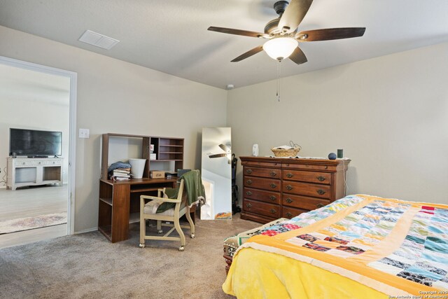 439 Agave Cir, Jourdanton, TX 78026 - carpeted bedroom with ceiling fan