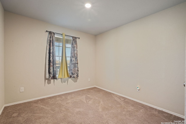 439 Agave Cir, Jourdanton, TX 78026 - empty room with carpet flooring