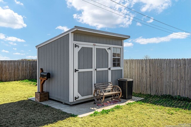 439 Agave Cir, Jourdanton, TX 78026 - view of outdoor structure with a lawn