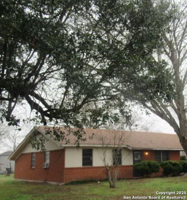 exterior space with a front lawn