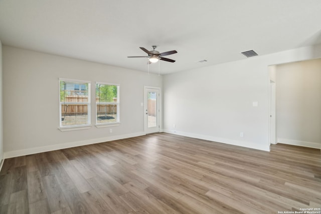 5712 Beths Way, San Antonio, TX 78253 - unfurnished room with a ceiling fan, wood finished floors, and baseboards