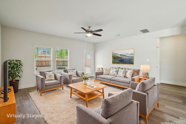 5712 Beths Way, San Antonio, TX 78253 - living room featuring a ceiling fan, wood finished floors, and baseboards