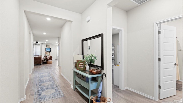 2437 Hiddenbrooke Trce, Seguin, TX 78155 - hallway featuring light hardwood / wood-style floors