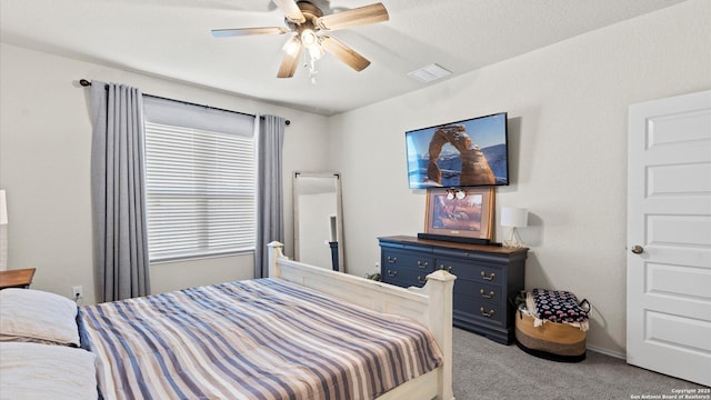 2437 Hiddenbrooke Trce, Seguin, TX 78155 - bedroom featuring light carpet and ceiling fan