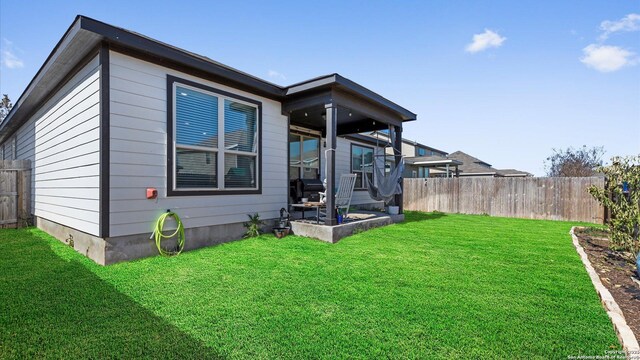 2437 Hiddenbrooke Trce, Seguin, TX 78155 - back of property with a yard