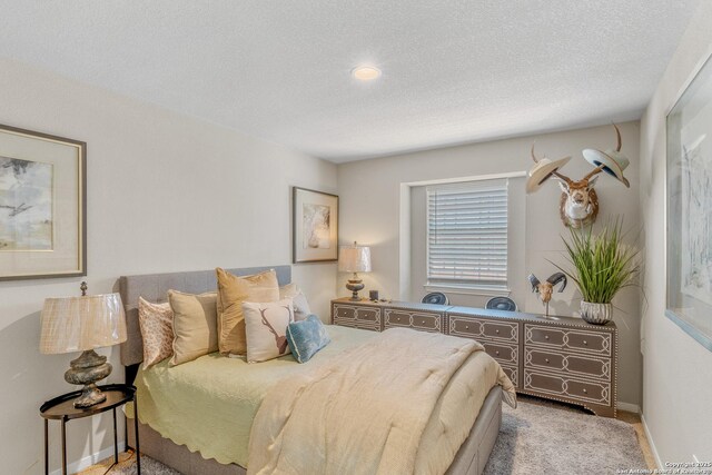 bedroom featuring a textured ceiling