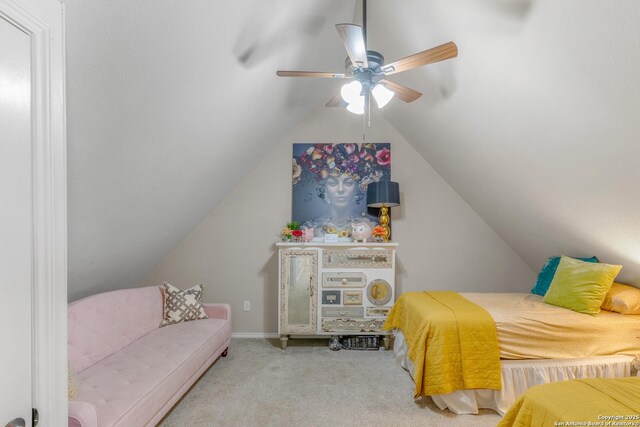 carpeted bedroom featuring lofted ceiling and ceiling fan