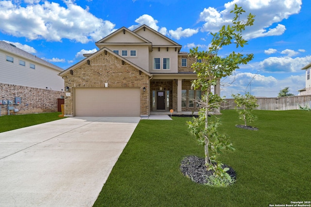 craftsman-style house with a garage and a front yard