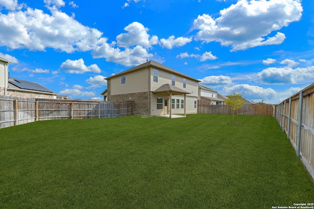 5129 Arrow Rdg, Marion, TX 78124 - back of house featuring a lawn