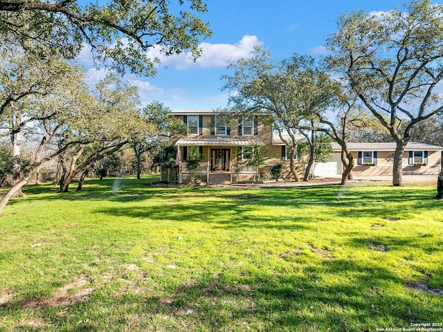 view of front of home featuring a front lawn