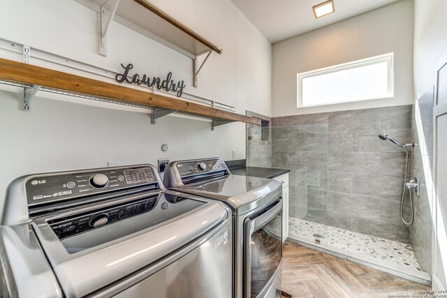 clothes washing area featuring laundry area and independent washer and dryer