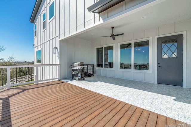 deck featuring ceiling fan and grilling area