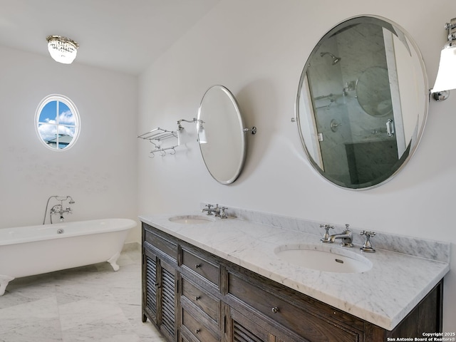 bathroom with vanity and independent shower and bath