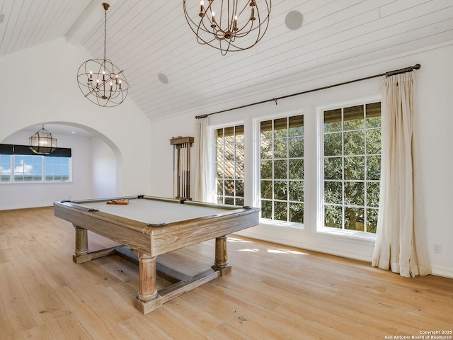 rec room featuring a notable chandelier, light hardwood / wood-style flooring, billiards, and beamed ceiling