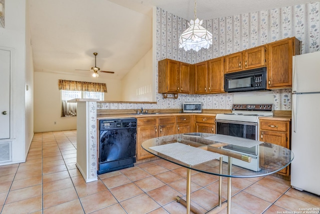 kitchen with light tile patterned floors, sink, hanging light fixtures, black appliances, and ceiling fan with notable chandelier