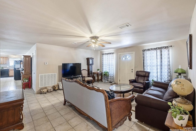 living room featuring light tile patterned flooring