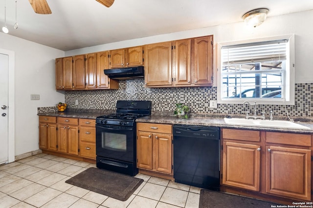 kitchen featuring sink, backsplash, black appliances, and ceiling fan