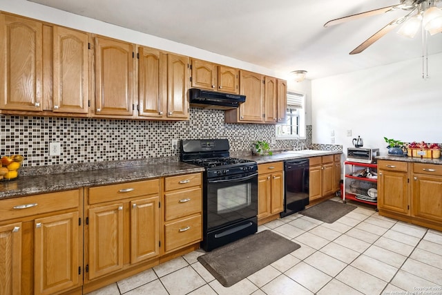 kitchen featuring sink, black appliances, light tile patterned floors, ceiling fan, and backsplash